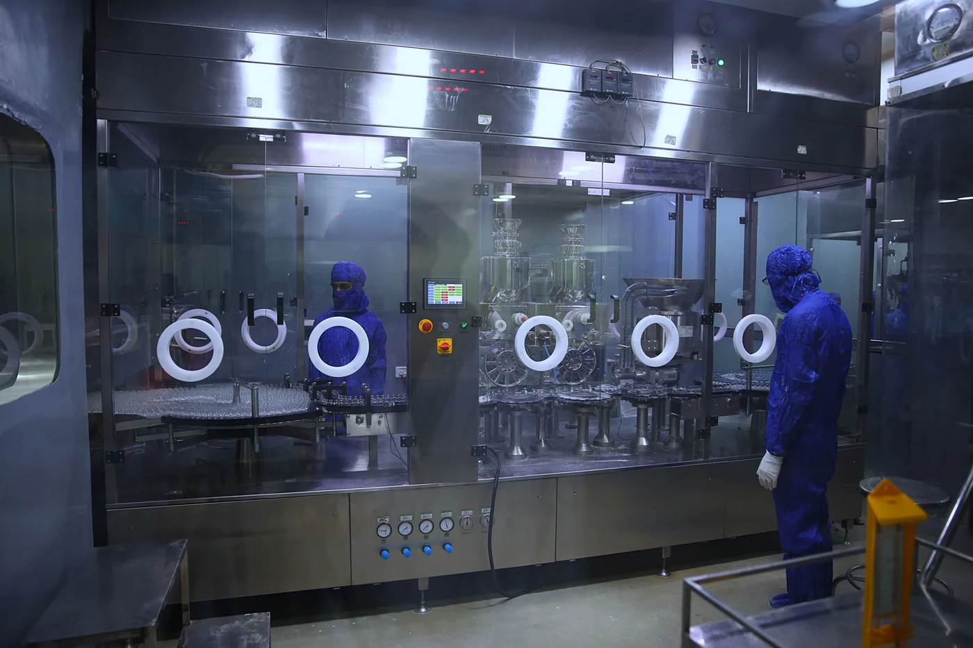 Enclosed vial processing equipment